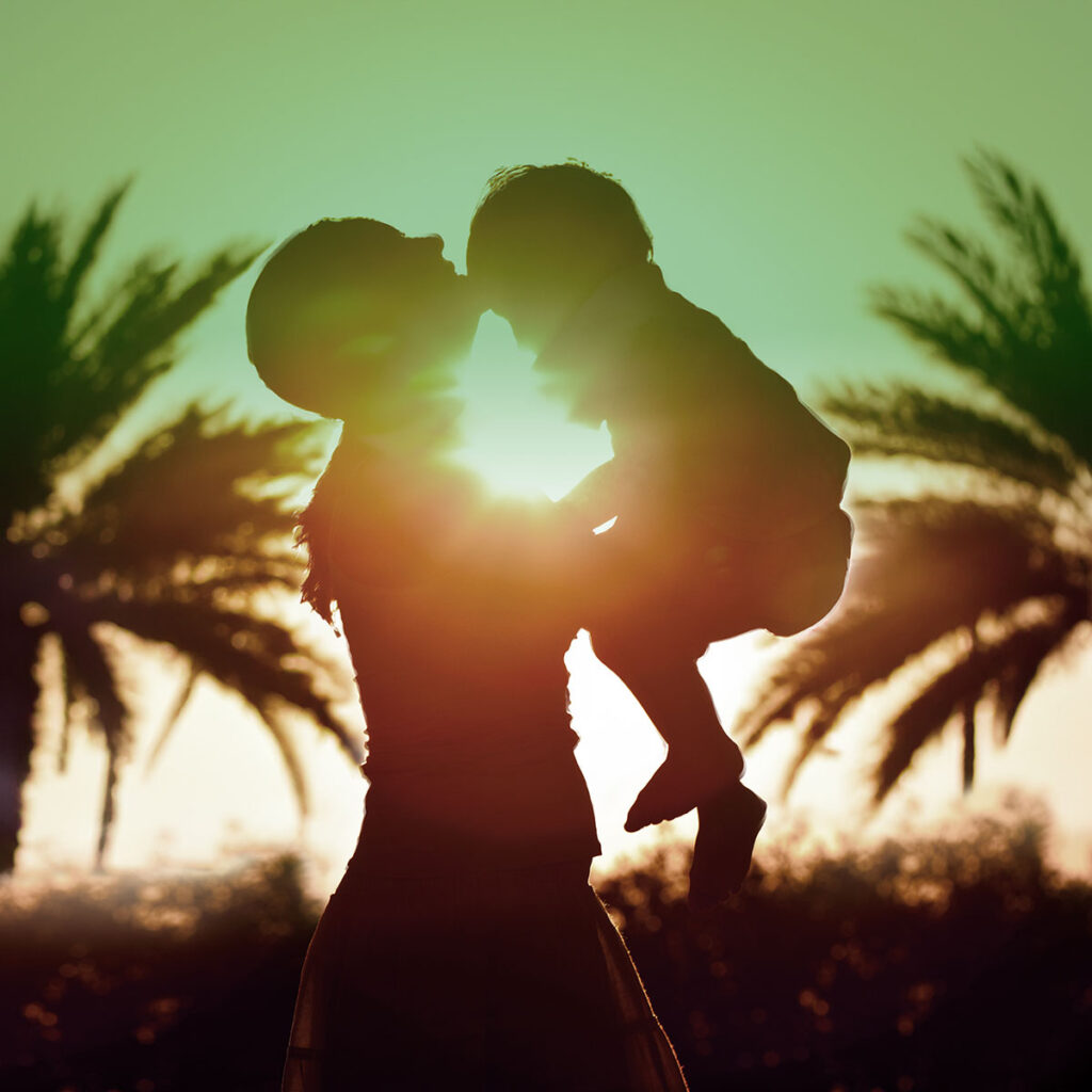 mother and son silhouette in dubai